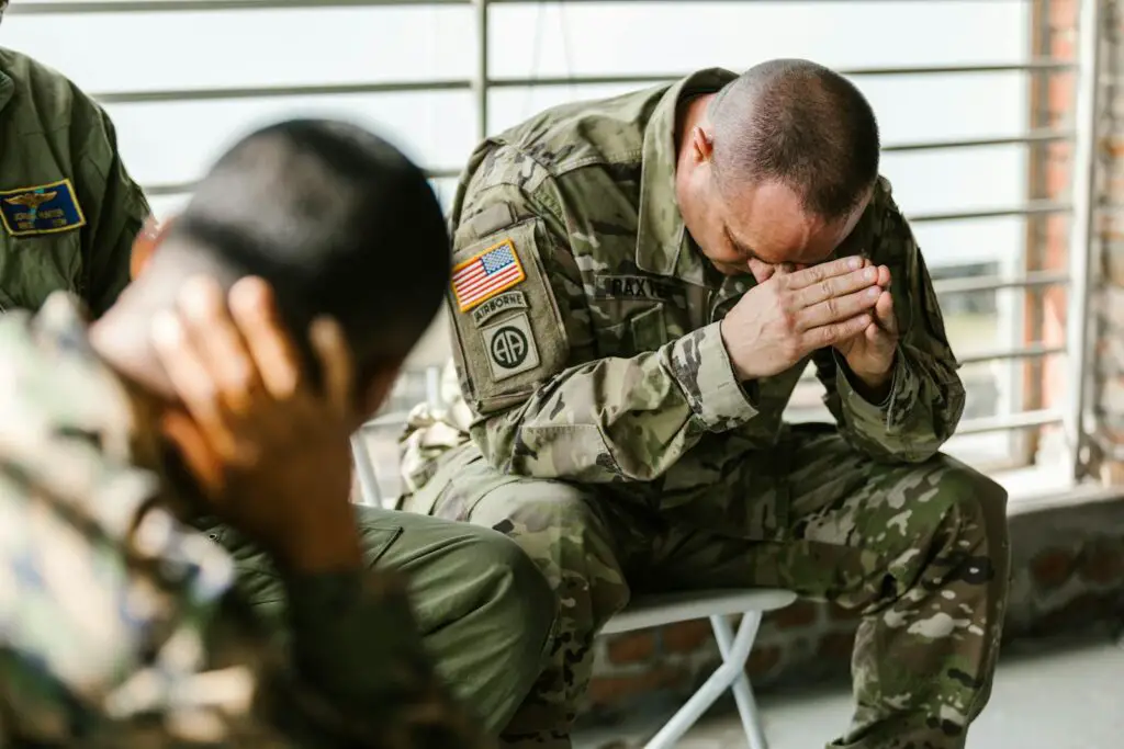 Photo of Man Resting his Head on his Hands