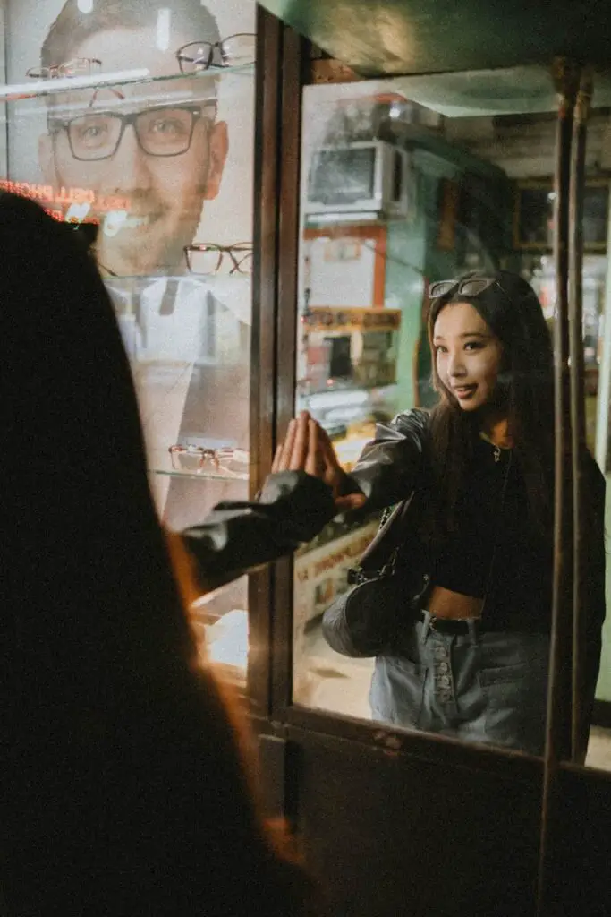 Girl Touching a Mirror