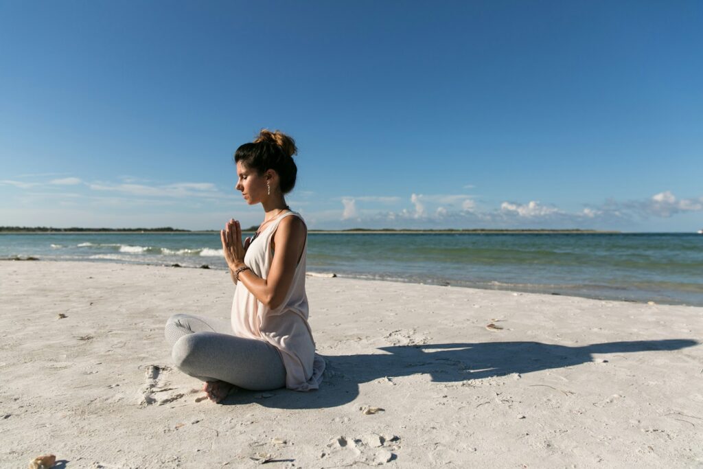 Prenatal Supplements: Know What You’re Taking 2 woman praying and sitting on sand seashore during day