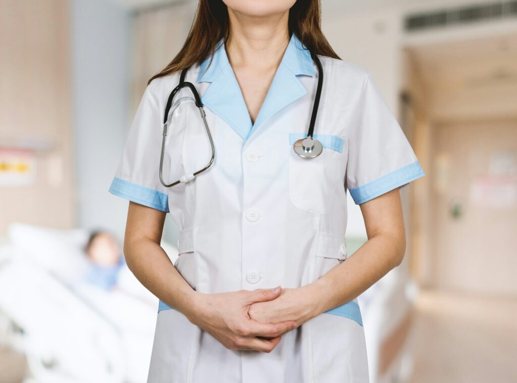Fast-Tracking Your Nursing Career with an Accelerated RN to BSN Program Online 2 woman in white button up shirt and blue stethoscope