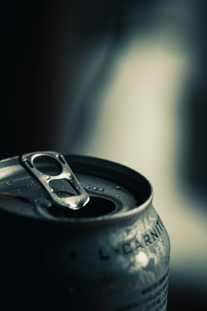 The Silent Epidemic Hiding in Your Neighborhood: Why America’s Alcohol Problem Isn’t Just a Phase 2 a close up of a can of soda
