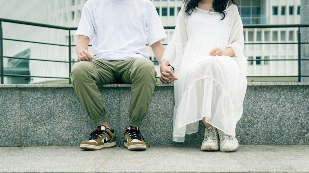 When to Consider Marriage Counseling: 7 Signs It's Time to Seek Help 2 man in white dress shirt sitting on white bench