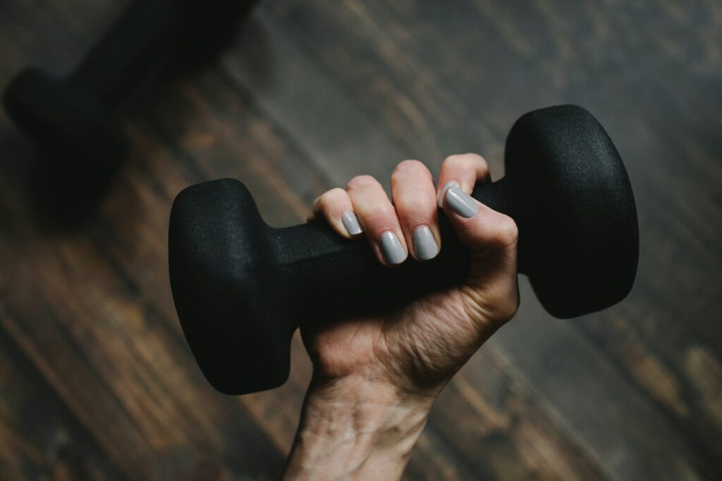 Why Grip Strength Matters: The Overlooked Foundation of Physical Performance 2 black dumbbell
