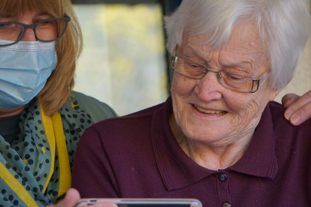 Warning Signs of Neglect in Nursing Care Facilities 2 woman in purple polo shirt wearing eyeglasses
